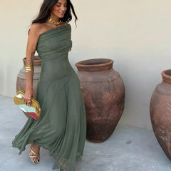 Toledo maxi dress in deep green, off-shoulder style with flowing skirt and gathered bodice