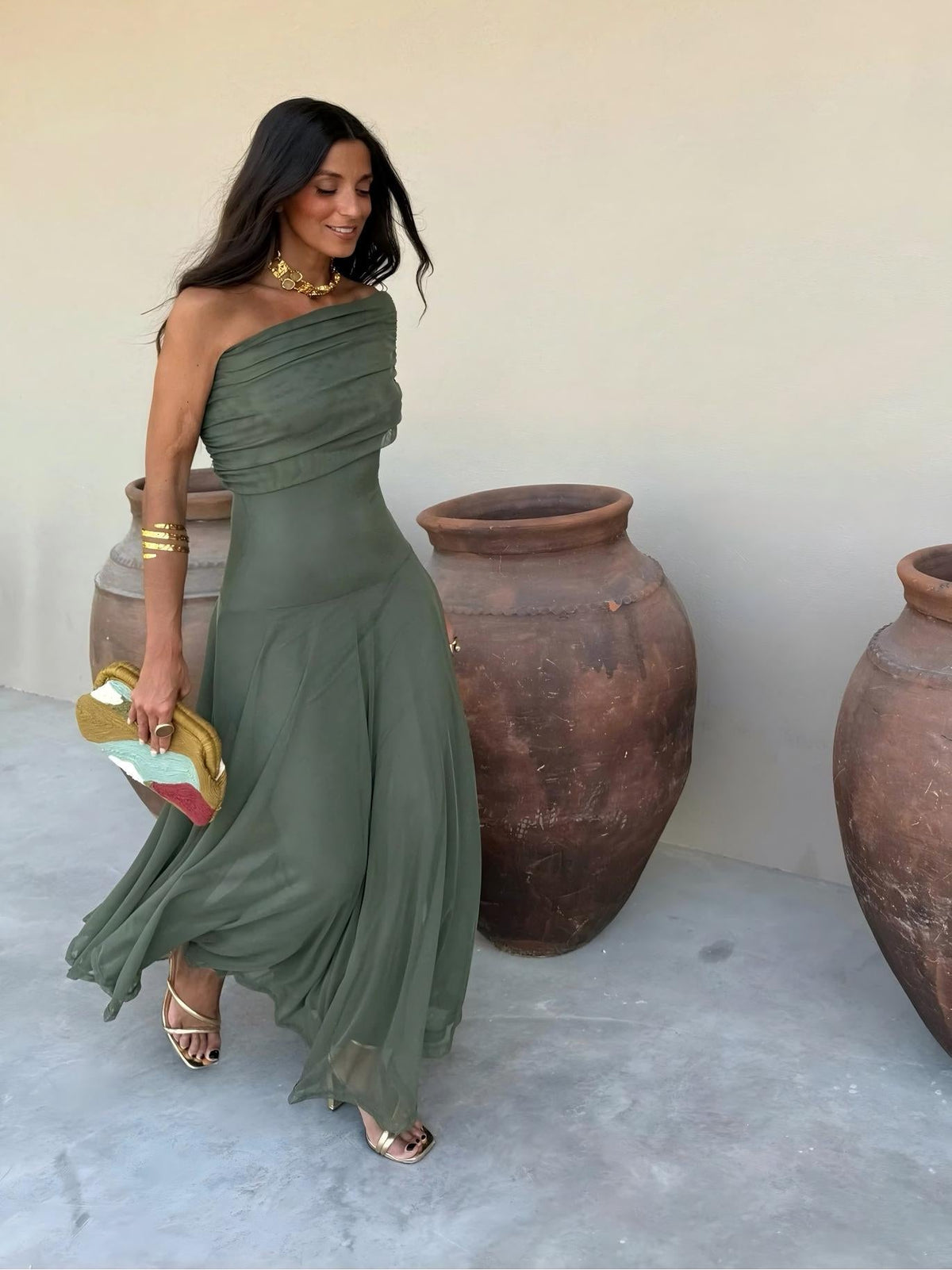 Toledo maxi dress in deep green, off-shoulder style with flowing skirt and gathered bodice