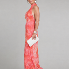 Orange halter neck maxi dress with pink abstract patterned print, sleeveless