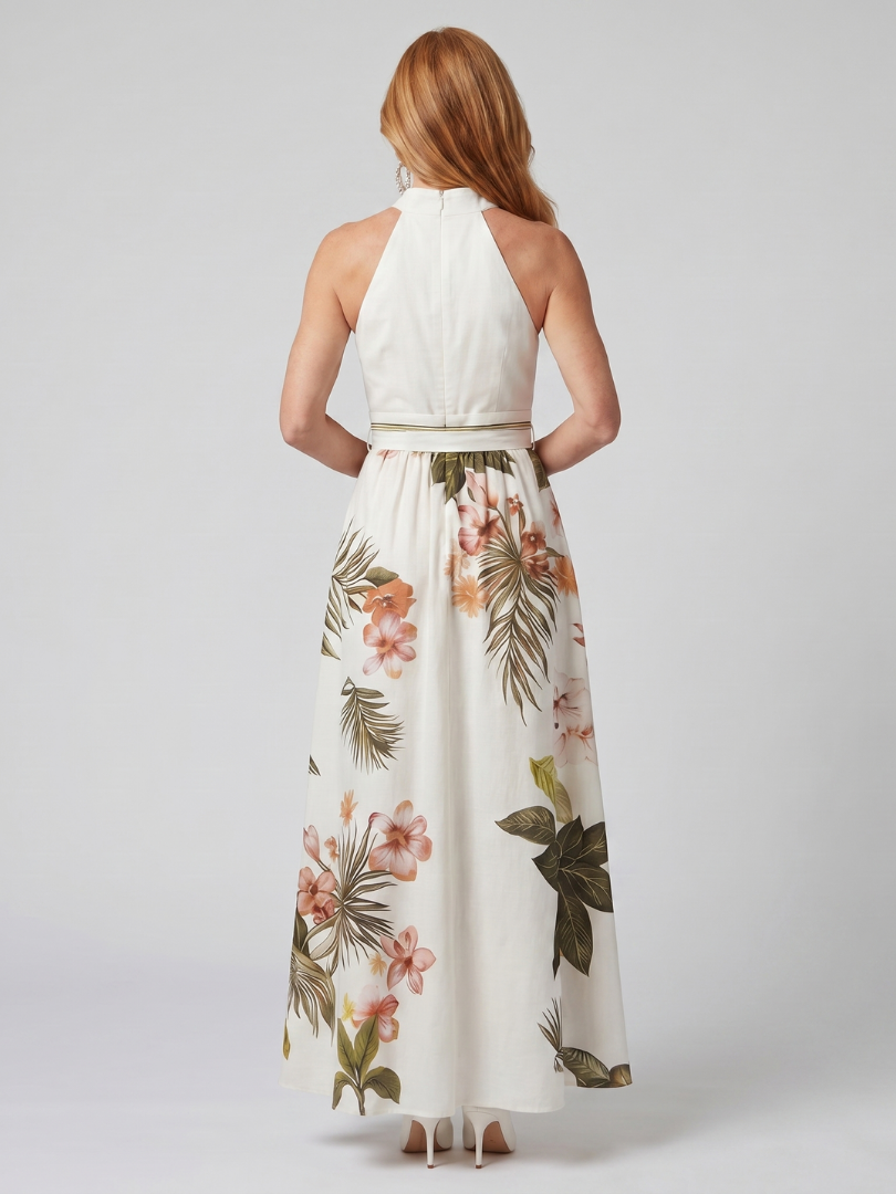 Back view: white halter maxi dress with open-back neckline and gathered waist; floral