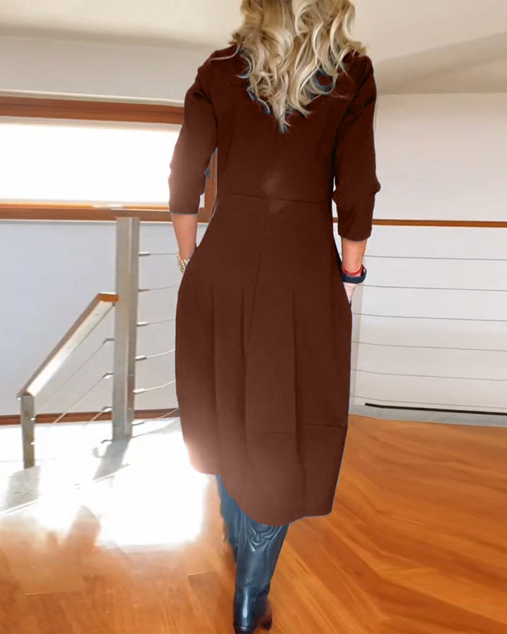 Nia casual elegance dress, brown color, midi length, three-quarter sleeves, back view