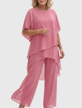Soft pink palazzo set with tiered overlay top and wide-leg trousers