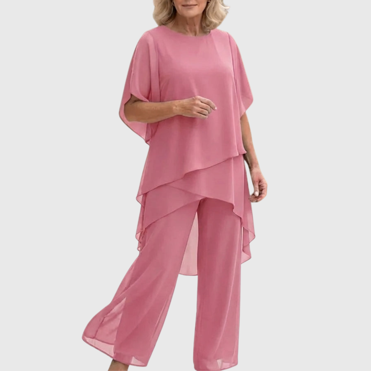 Soft pink palazzo set with tiered overlay top and wide-leg trousers