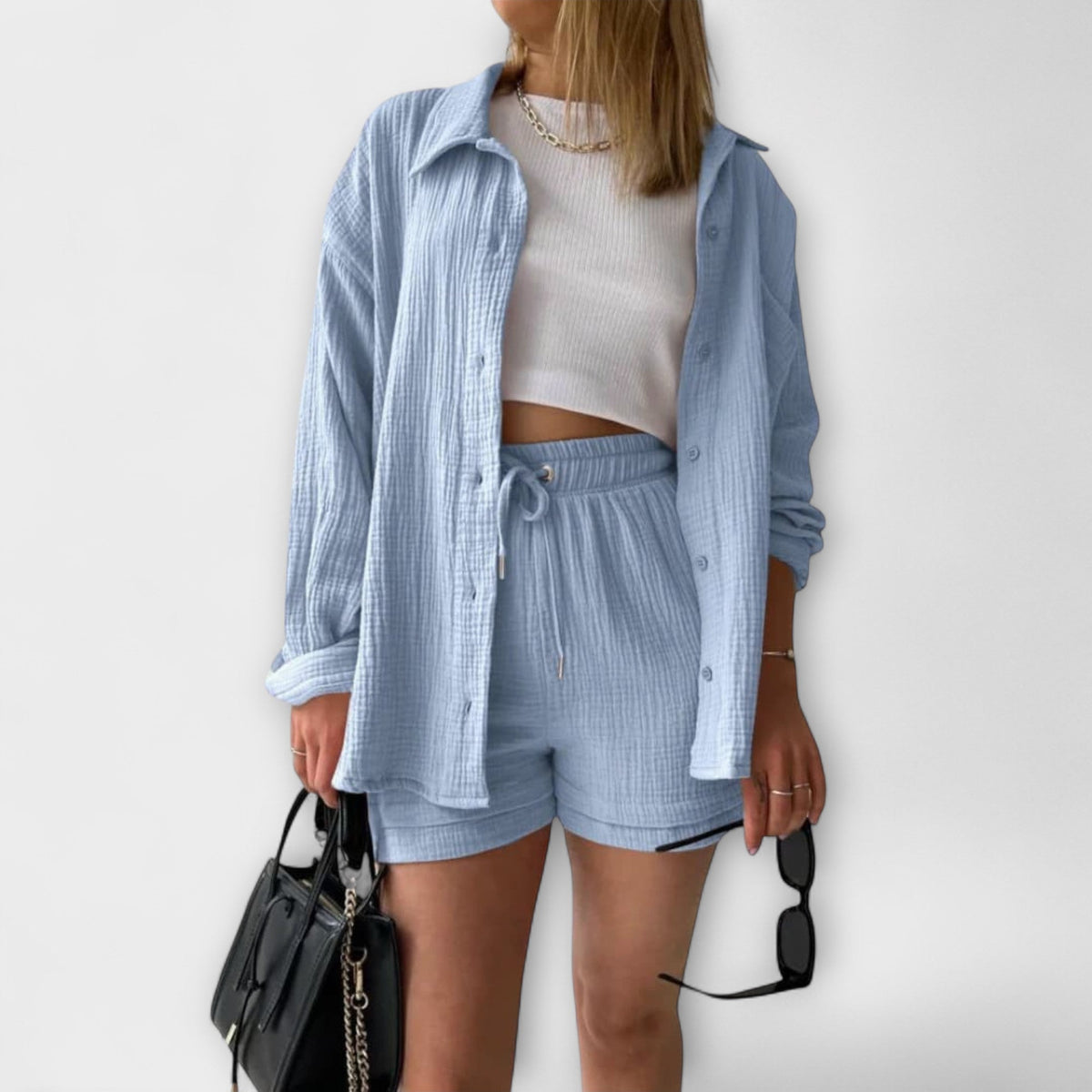 Light blue two-piece set: button-front shirt with drawstring-waist shorts
