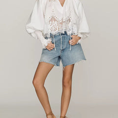 White lace V-neck blouse with oversized sleeves and front lace insert with tie details