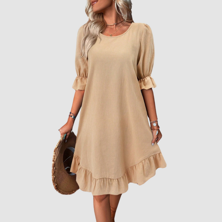 Khaki flowy summer dress with half sleeves and gathered ruffle hem.
