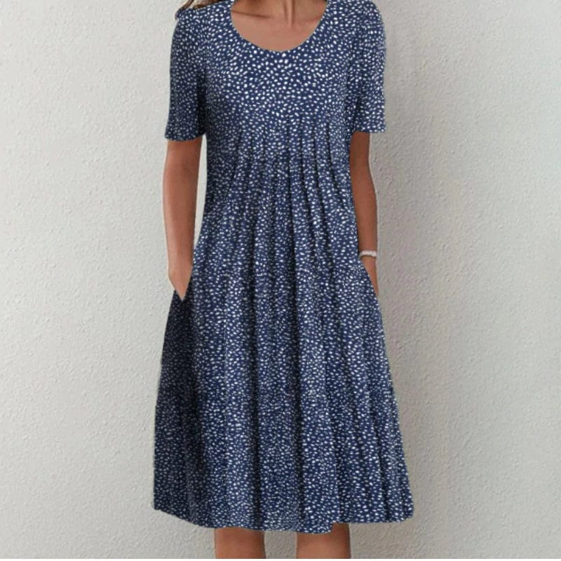 Navy dotted dress with scoop neck, short sleeves, gathered A-line skirt