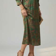 Dark green patterned wrap midi dress with long sleeves and tied waist