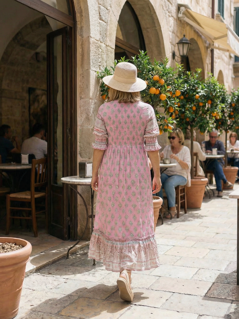 Pink tiered midi dress, V-back styling with allover floral print