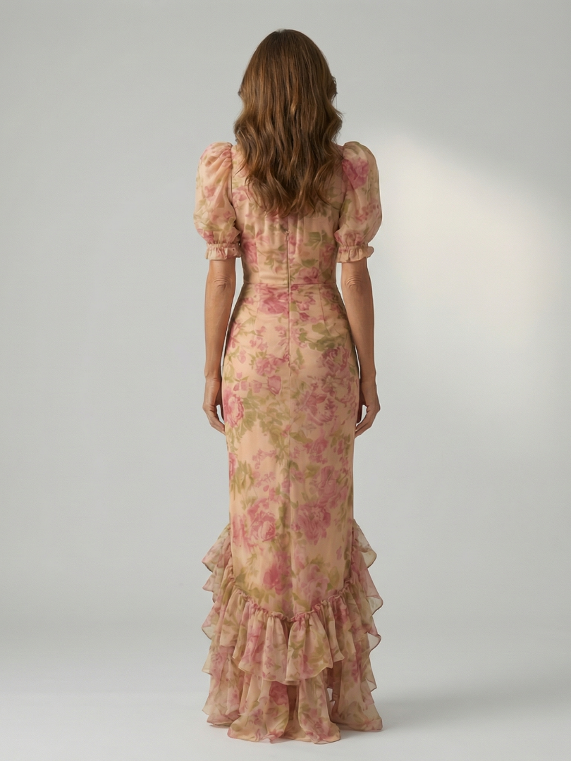 Floral pink high-neck maxi dress, back view, short puff sleeves and tiered ruffle hem.