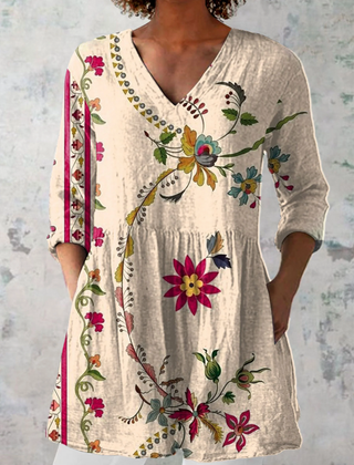 Women's beige V-neck long-sleeve blouse with multicolor floral print
