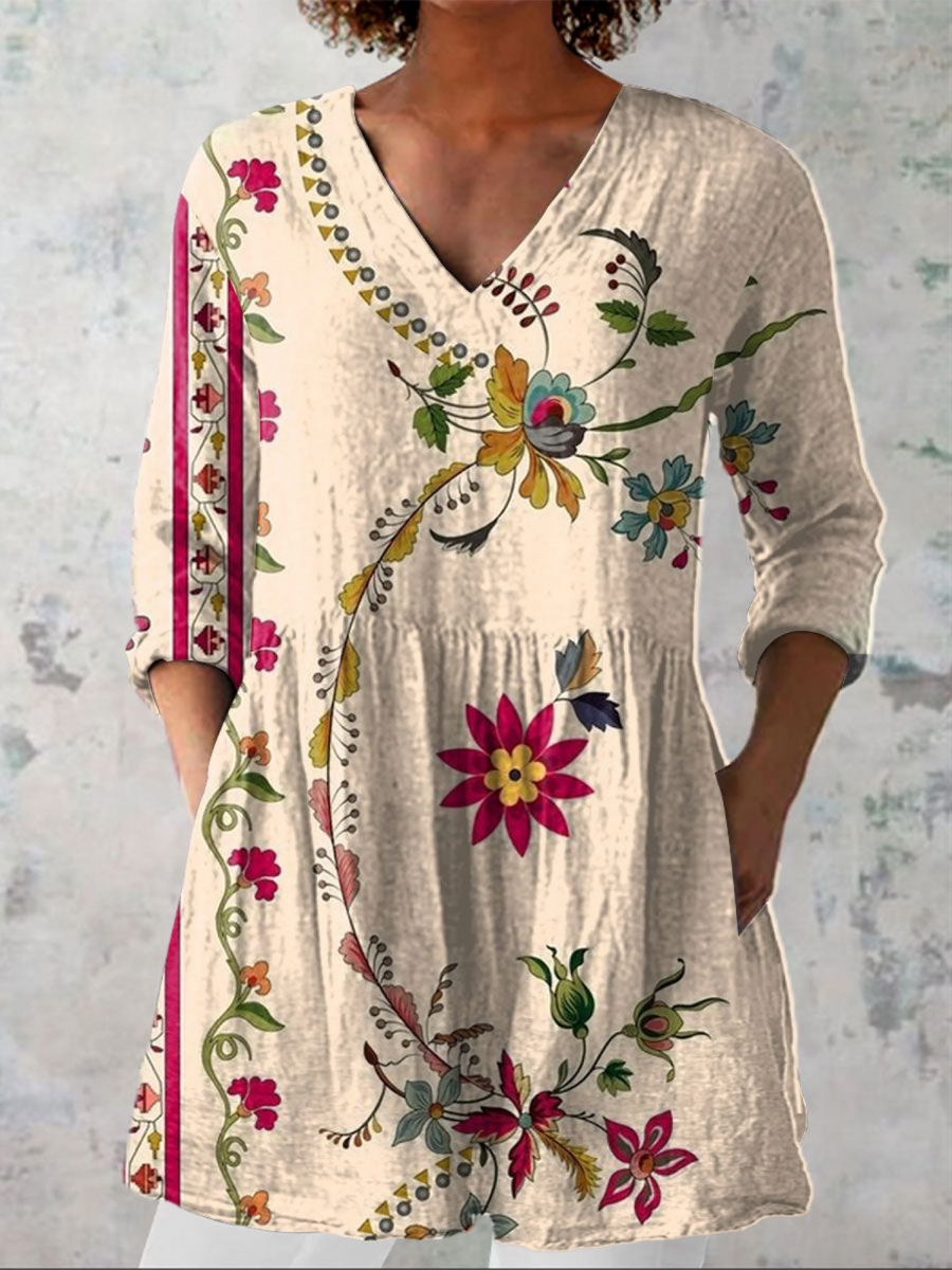 Women's beige V-neck long-sleeve blouse with multicolor floral print