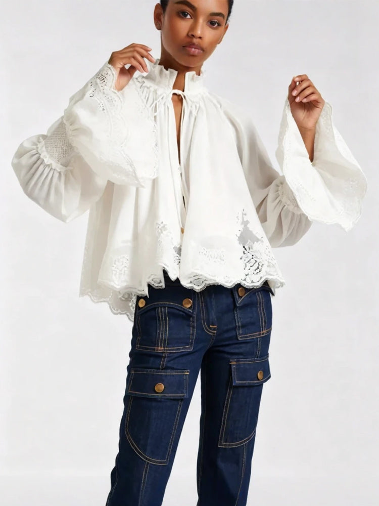 Vivienne blouse in white with front keyhole opening, embroidered lace hem, puff sleeves
