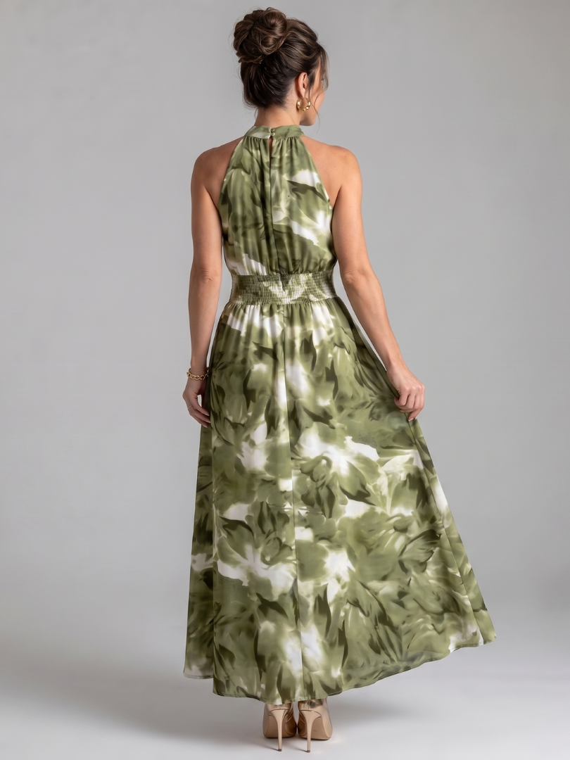 Green abstract print halter midi dress, back view with gathered waist