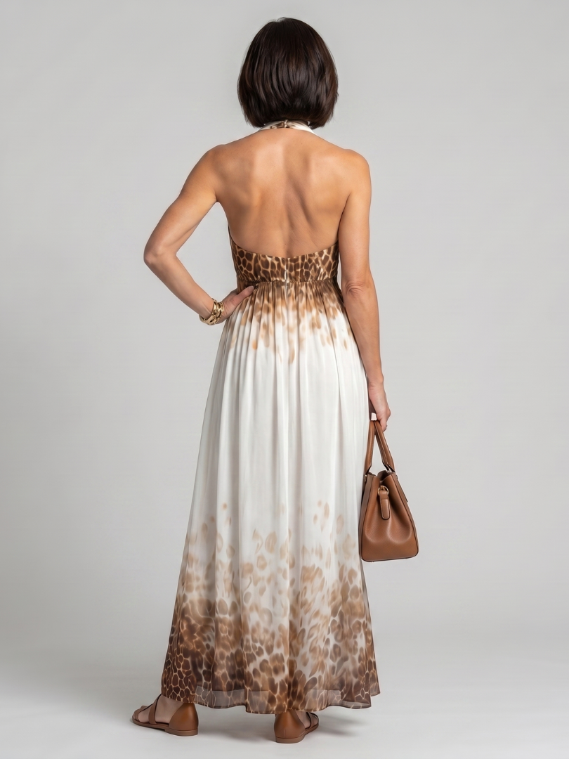 Pleated halter midi dress back view in white with brown leopard-print hem