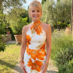Halter neck floral midi dress in white with orange flower print, sleeveless fitted