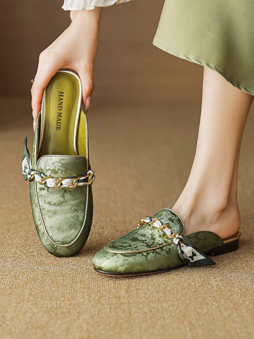 Green genuine leather mules with floral print, braided bow detail, flat slip-on
