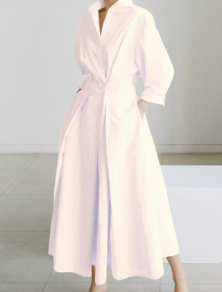 Off-white shirt dress with V-neck, long sleeves, and tie waist detail