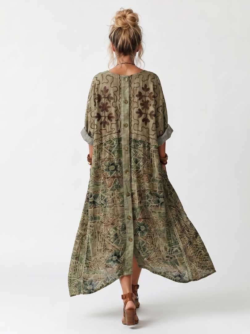 Green patterned oversized midi dress, back view with button placket and flowing asym hem