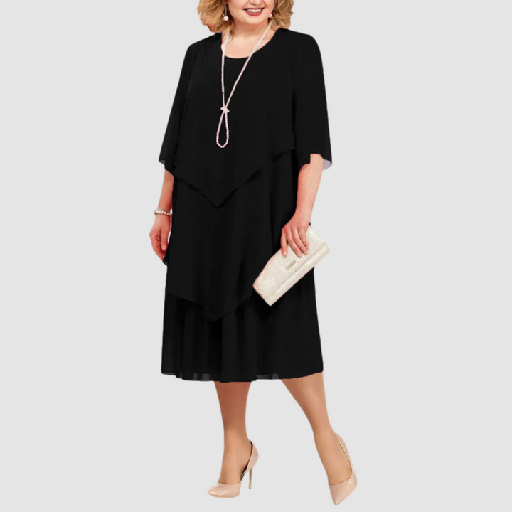 Black chiffon midi dress with layered ruffle front, short sleeves, and round neckline