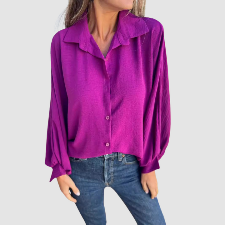 Purple oversized button-up blouse with collar and front buttons, long sleeves