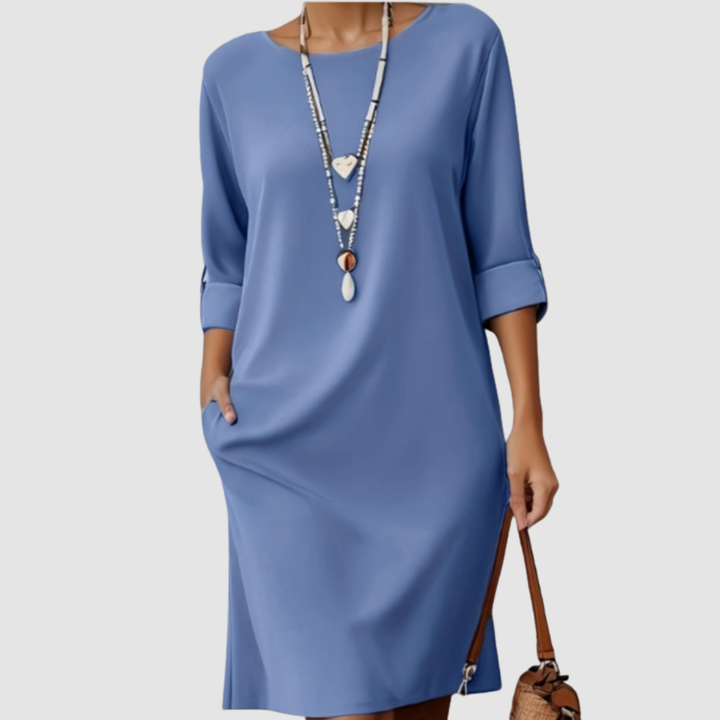 Blue crew-neck midi dress, 3/4 sleeves, loose fit with side slit.