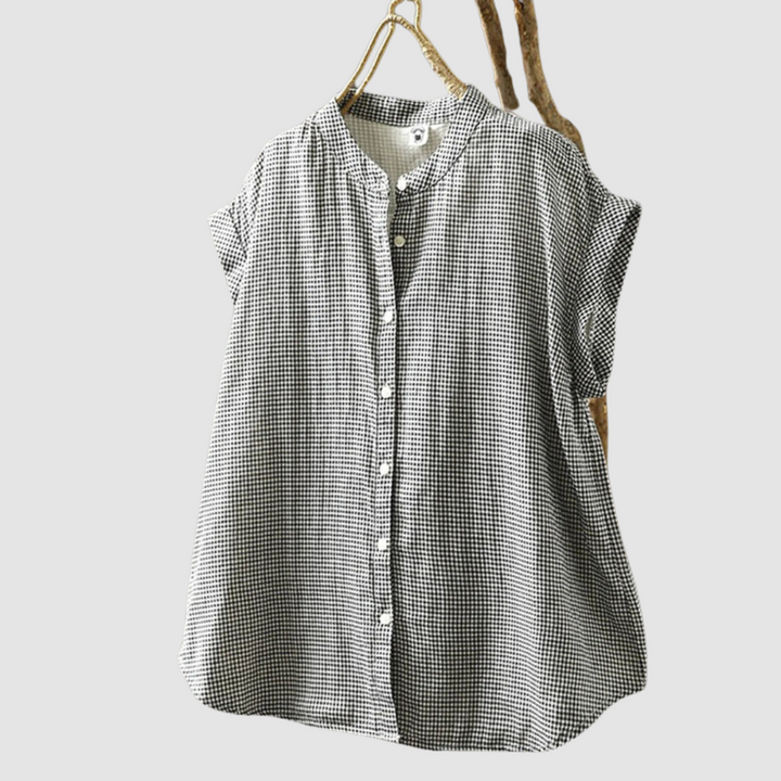 Vintage button-up shirt with black-and-white check pattern, short sleeves, stand collar