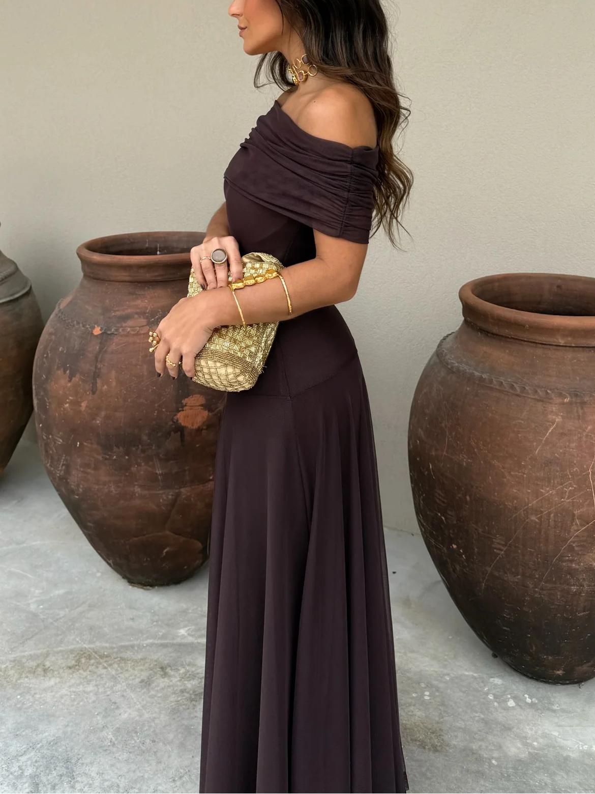 Dark plum off-shoulder ruched maxi dress with draped shoulder detail and long skirt