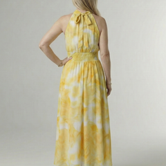 Yellow tie-dye halter midi dress, back view with gathered neckline and smocked waist