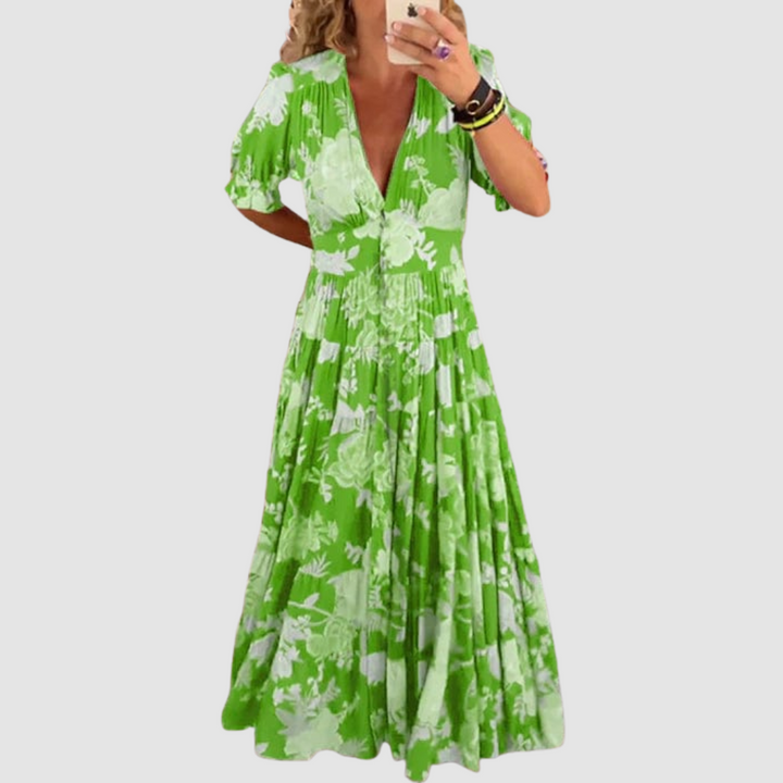 Green long floral dress with V-neck, short puff sleeves, tiered skirt