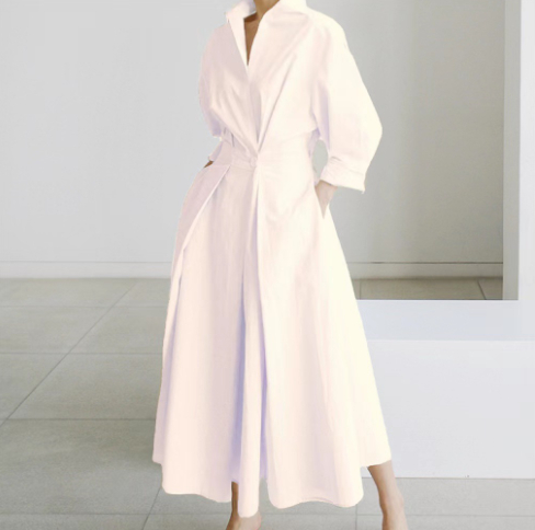 Light pink shirt dress with collar, long sleeves, and fitted waist tie