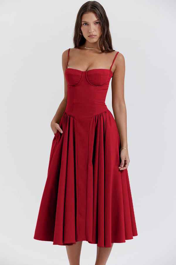 Red corset sundress with sweetheart neckline and gathered pleated skirt