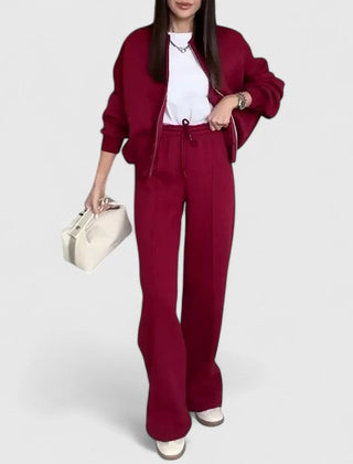 Zip-up sweater and drawstring pants set in deep red, relaxed fit with side pockets.