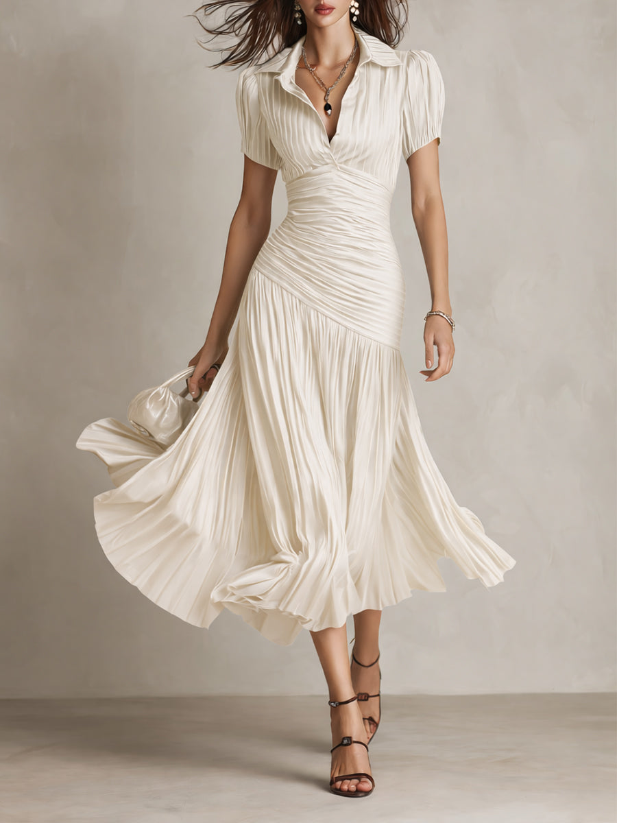 Milky white ruched midi dress with V-neck, short sleeves, and flared tiered skirt