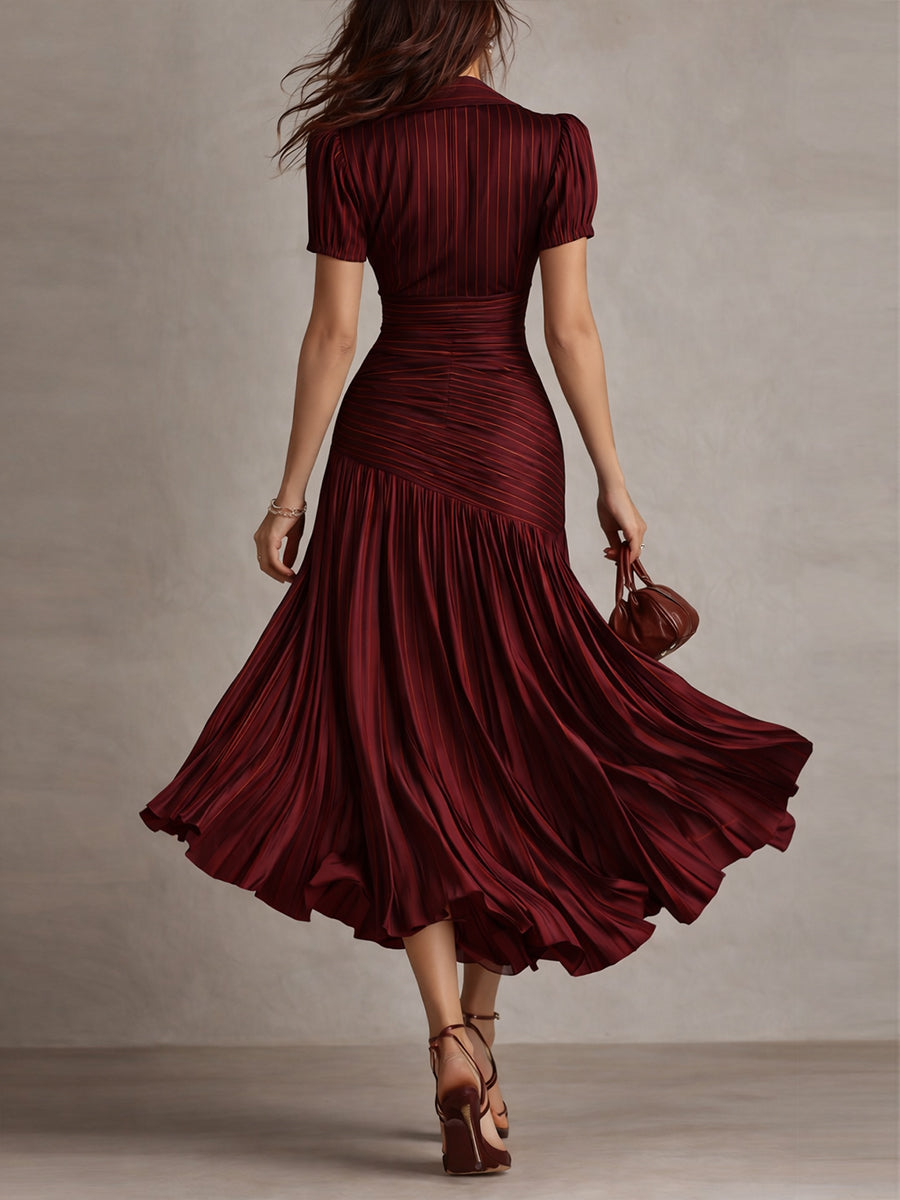 Wine red ruched midi dress, back view, short sleeves and pleated flared skirt