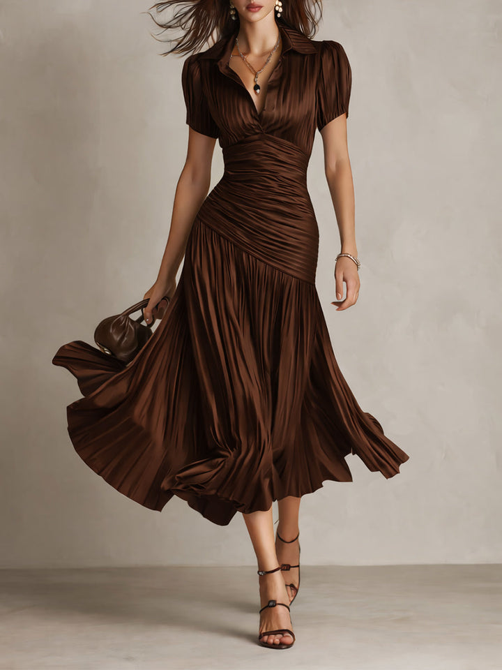 Dark brown ruched midi dress with V-neck and short sleeves, flared pleated skirt