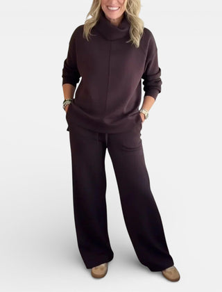 Burgundy two-piece lounge set with hooded pullover and wide-leg pants