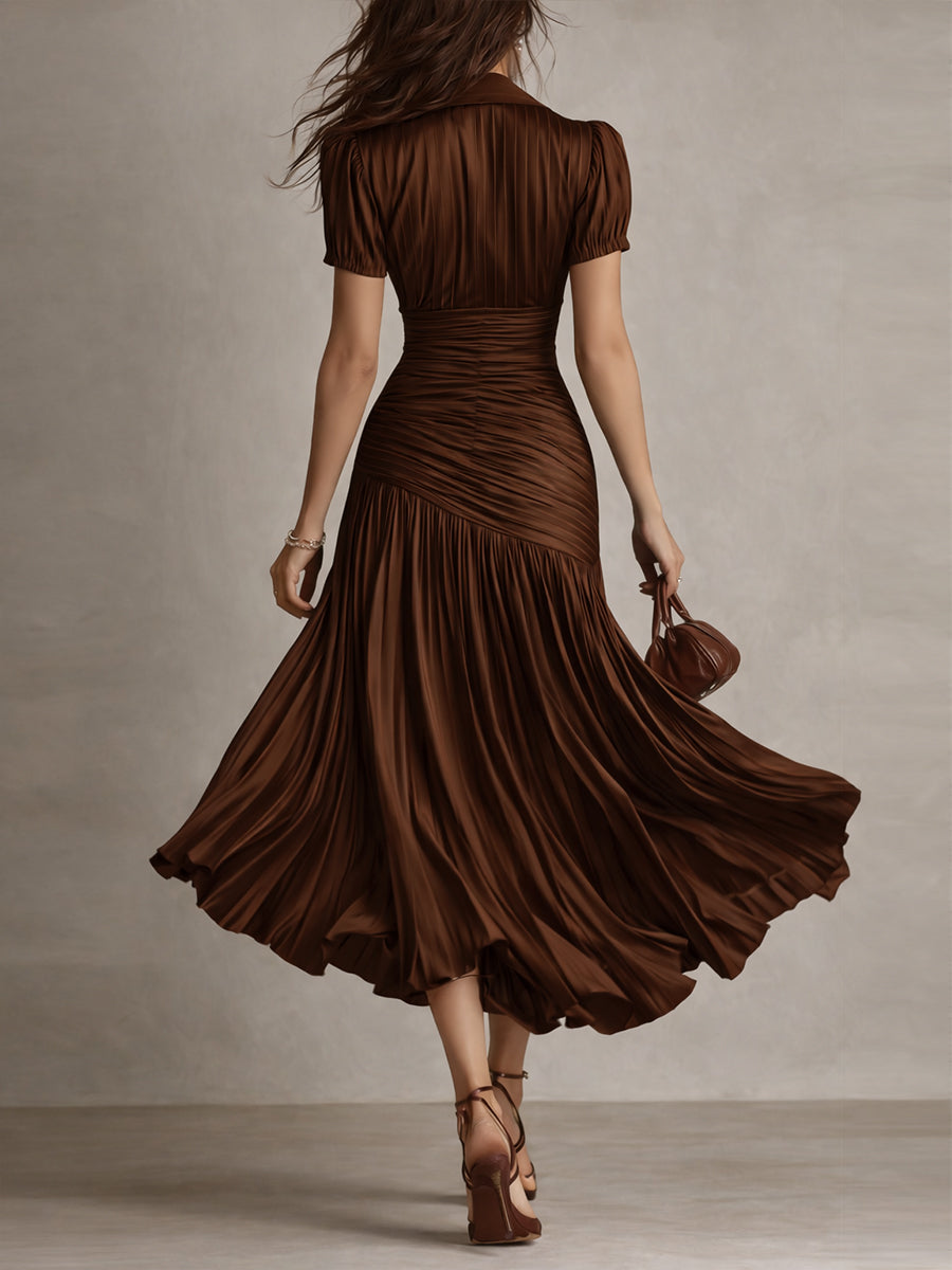 Dark brown ruched midi dress, back view, short sleeves and flared pleated skirt