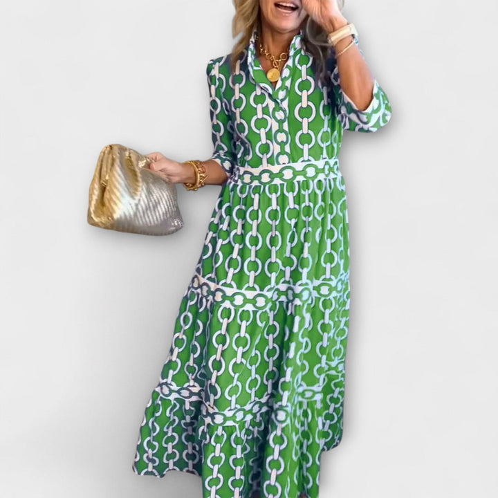 Green chain-print midi dress with short sleeves and tiered skirt