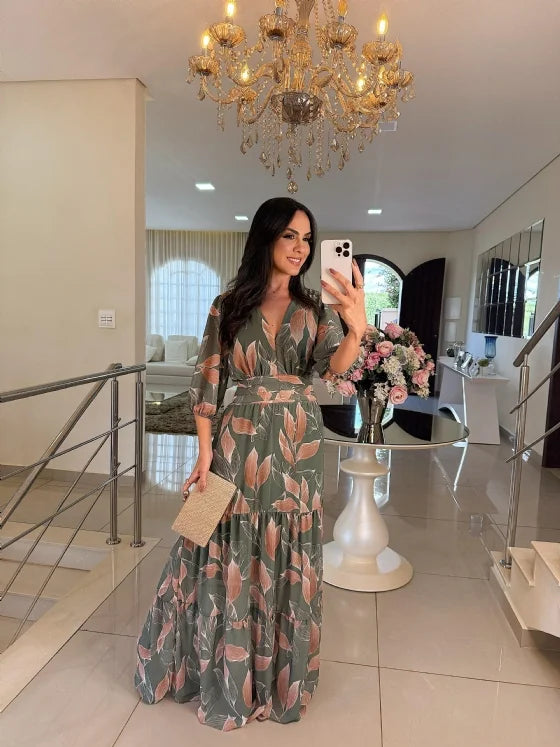 Green floral maxi dress with tie waist and three-quarter sleeves