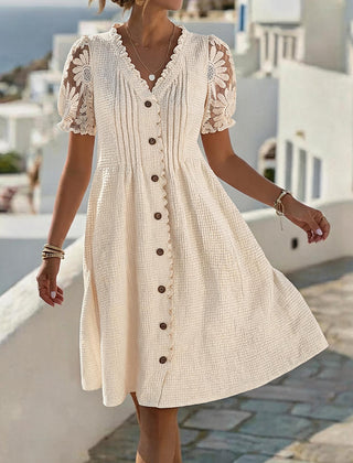 Beige balloon-sleeve midi dress with lace details and button front