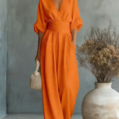 Women’s wide-leg jumpsuit in orange, V-neck, elastic waist, dolman sleeves
