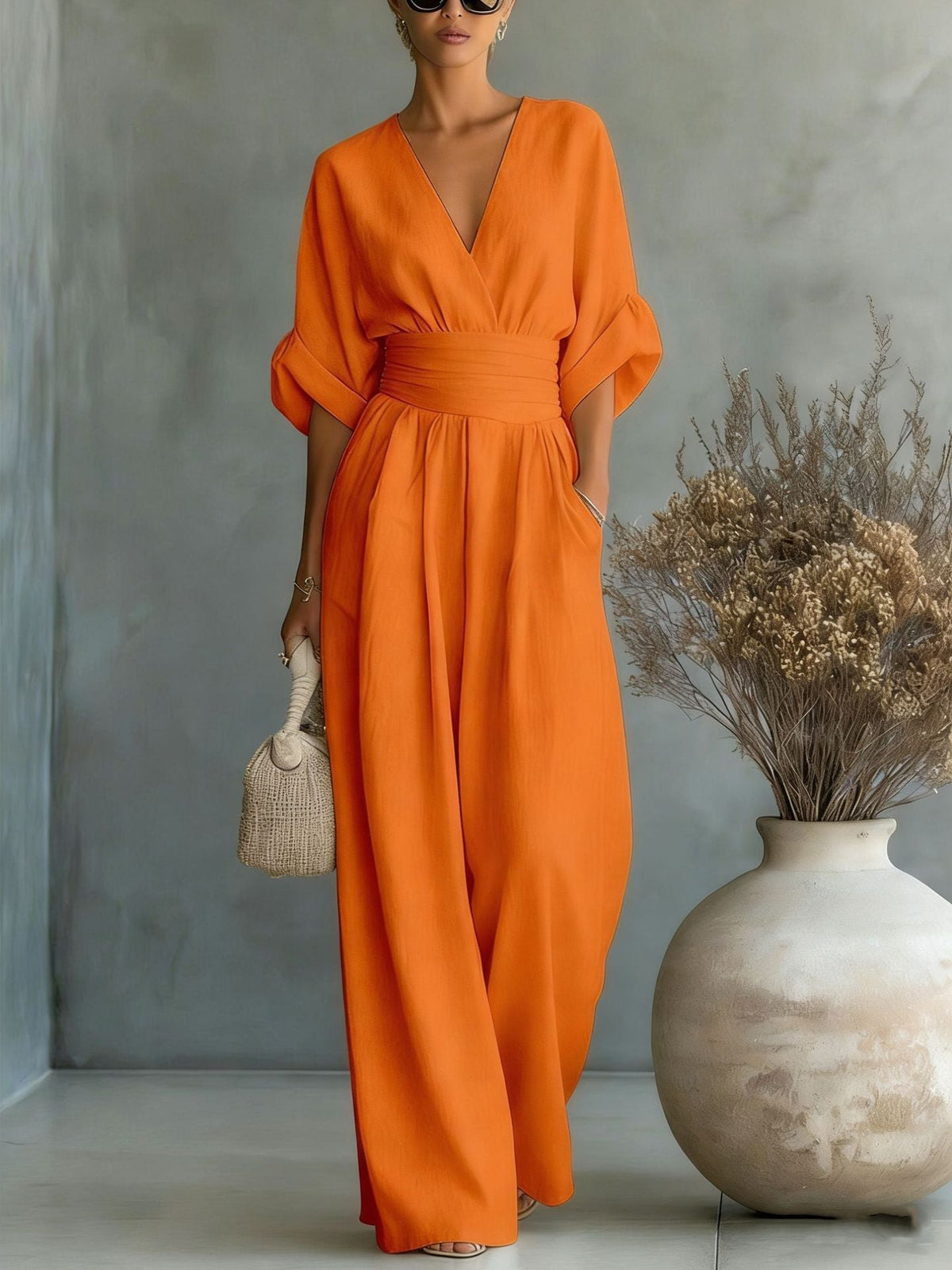 Women’s wide-leg jumpsuit in orange, V-neck, elastic waist, dolman sleeves