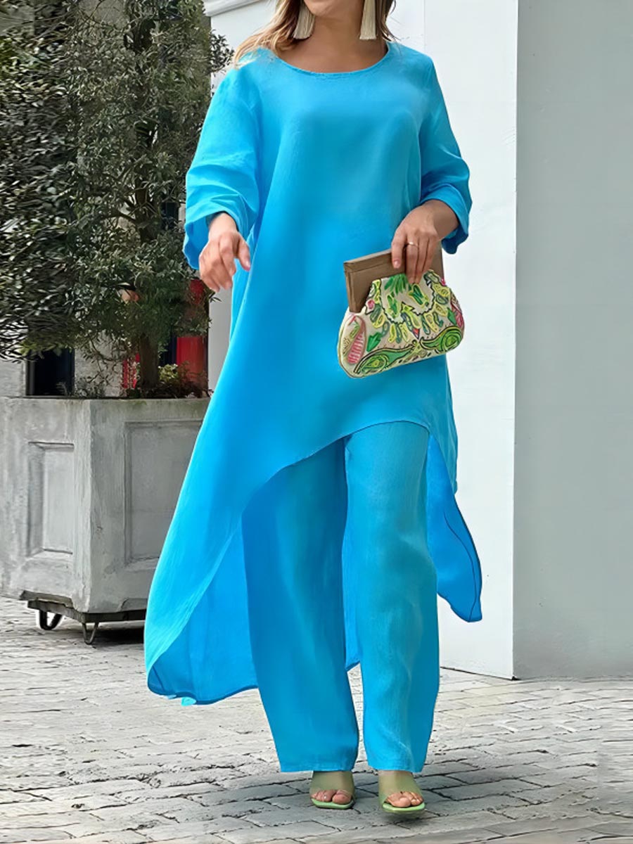 Blue Julieta set: relaxed tunic with 3/4 sleeves and asymmetrical hem, plus matching pants.