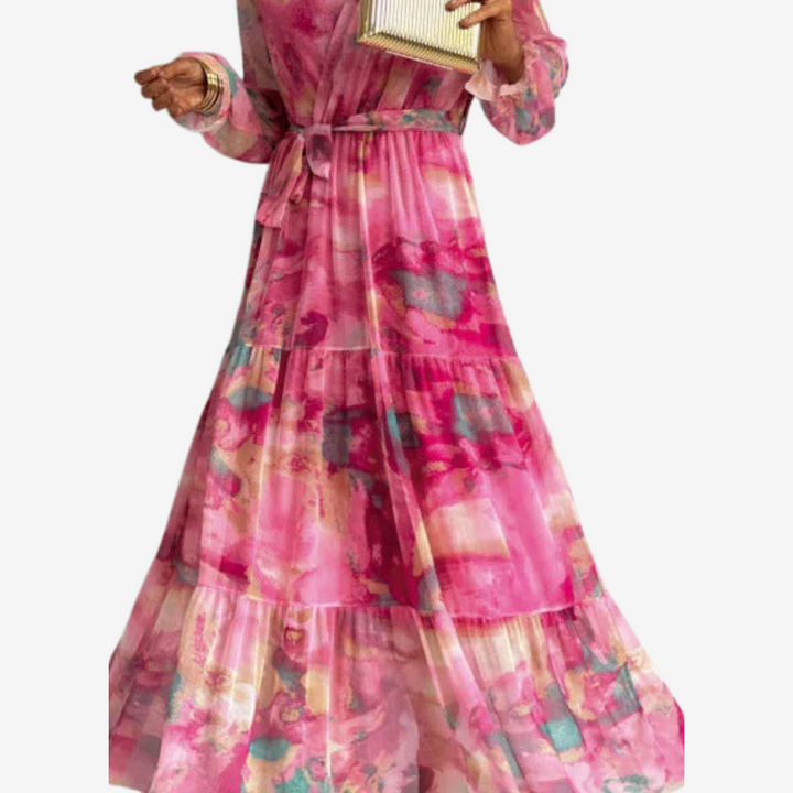 Pink floral tiered maxi dress with belted waist and flowing skirt tiers