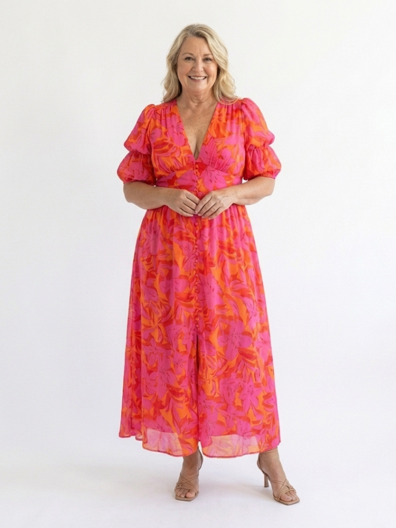 Pink floral V-neck midi dress with puff sleeves and gathered waist, full length