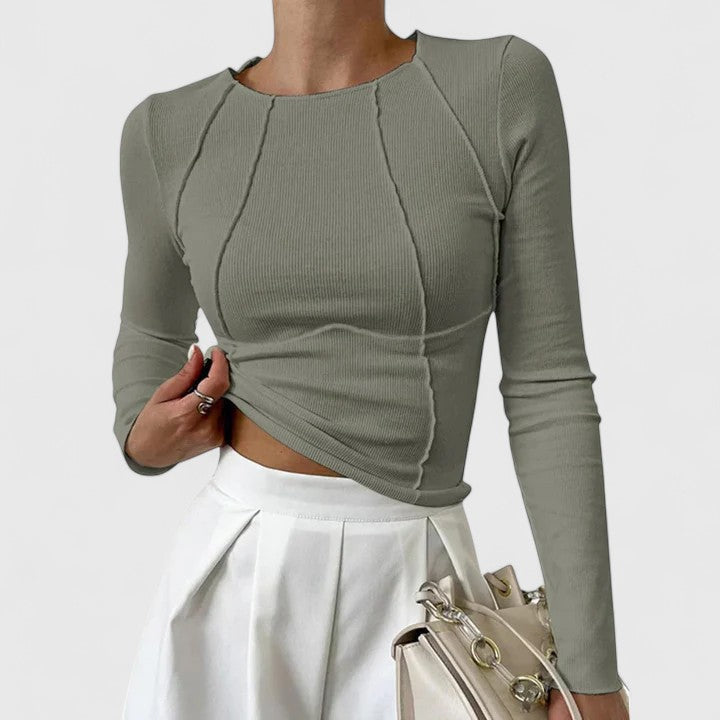 Olive green long-sleeve knit top with crew neck and draped ruched front; fitted cropped hem