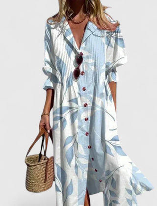 Light blue boho dress with leaf print, V-neck and button-front with short sleeves