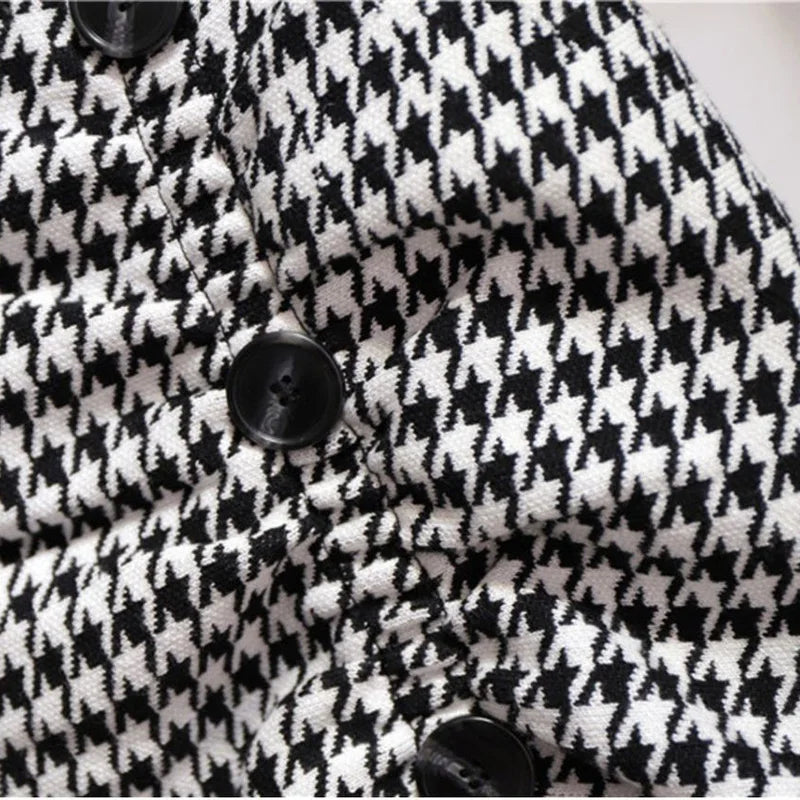 Houndstooth fabric asymmetric skirt with black button closures
