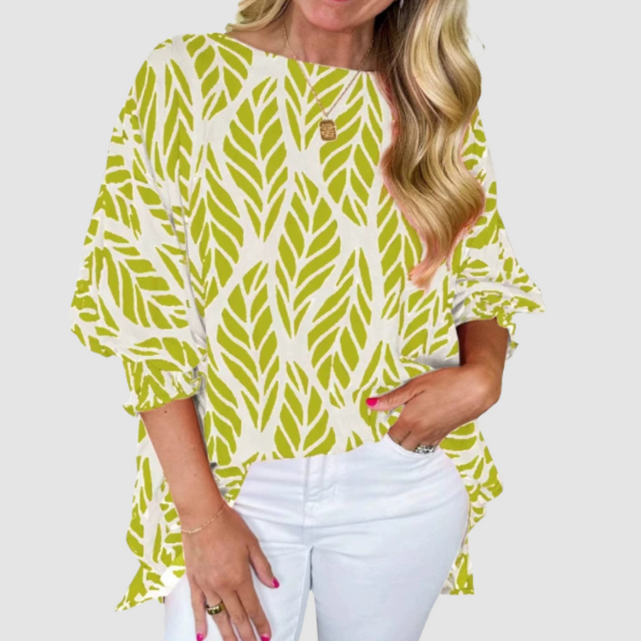White and lime leaf-pattern loose blouse with round neck and loose elbow-length sleeves